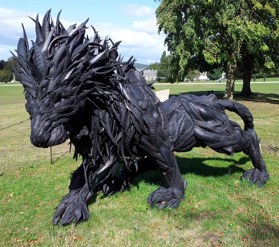 lion sculpture made of tires